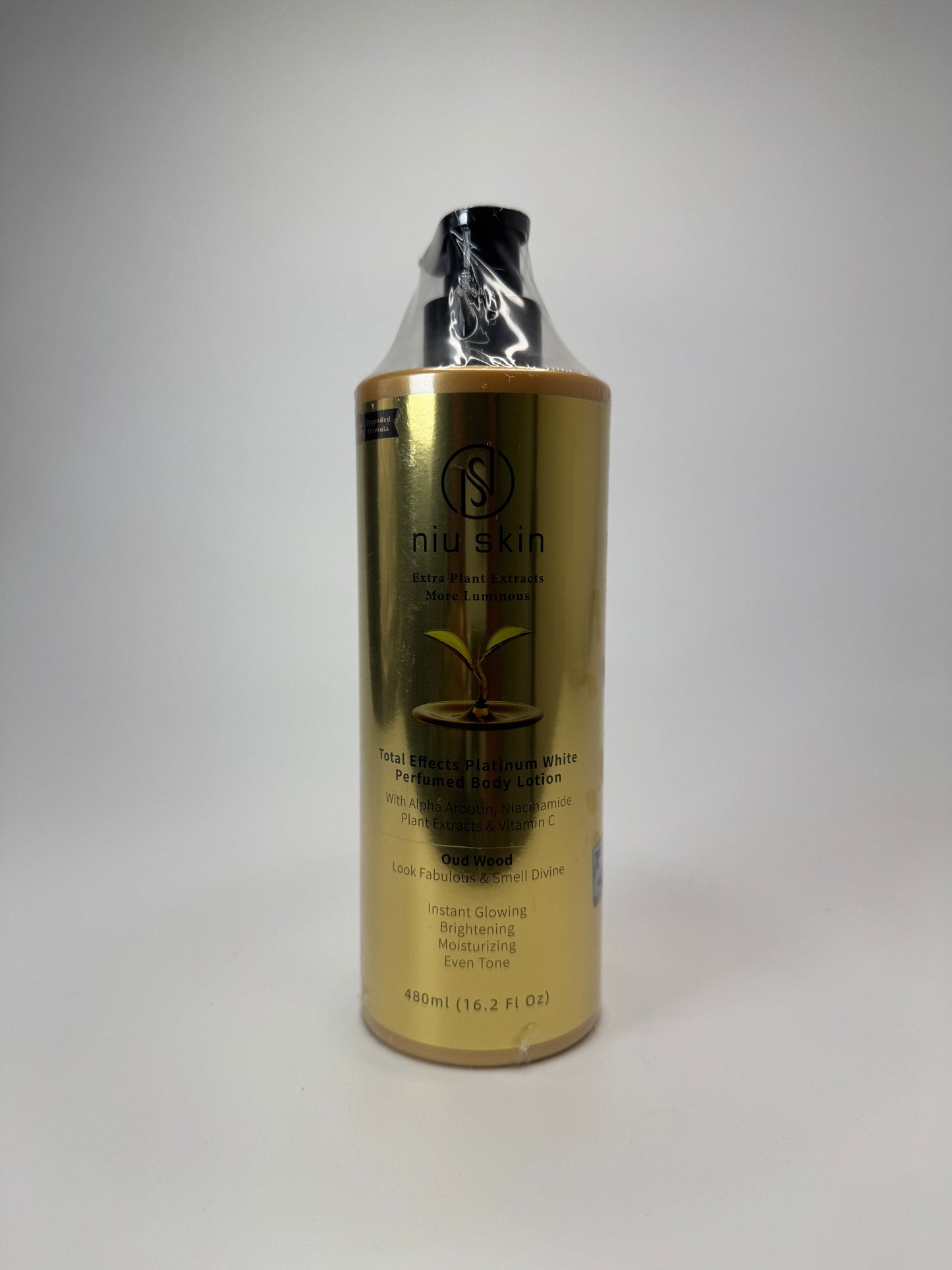 Niu Skin Total Effects Platinum White Perfumed Body Lotion in Oud Wood scent.